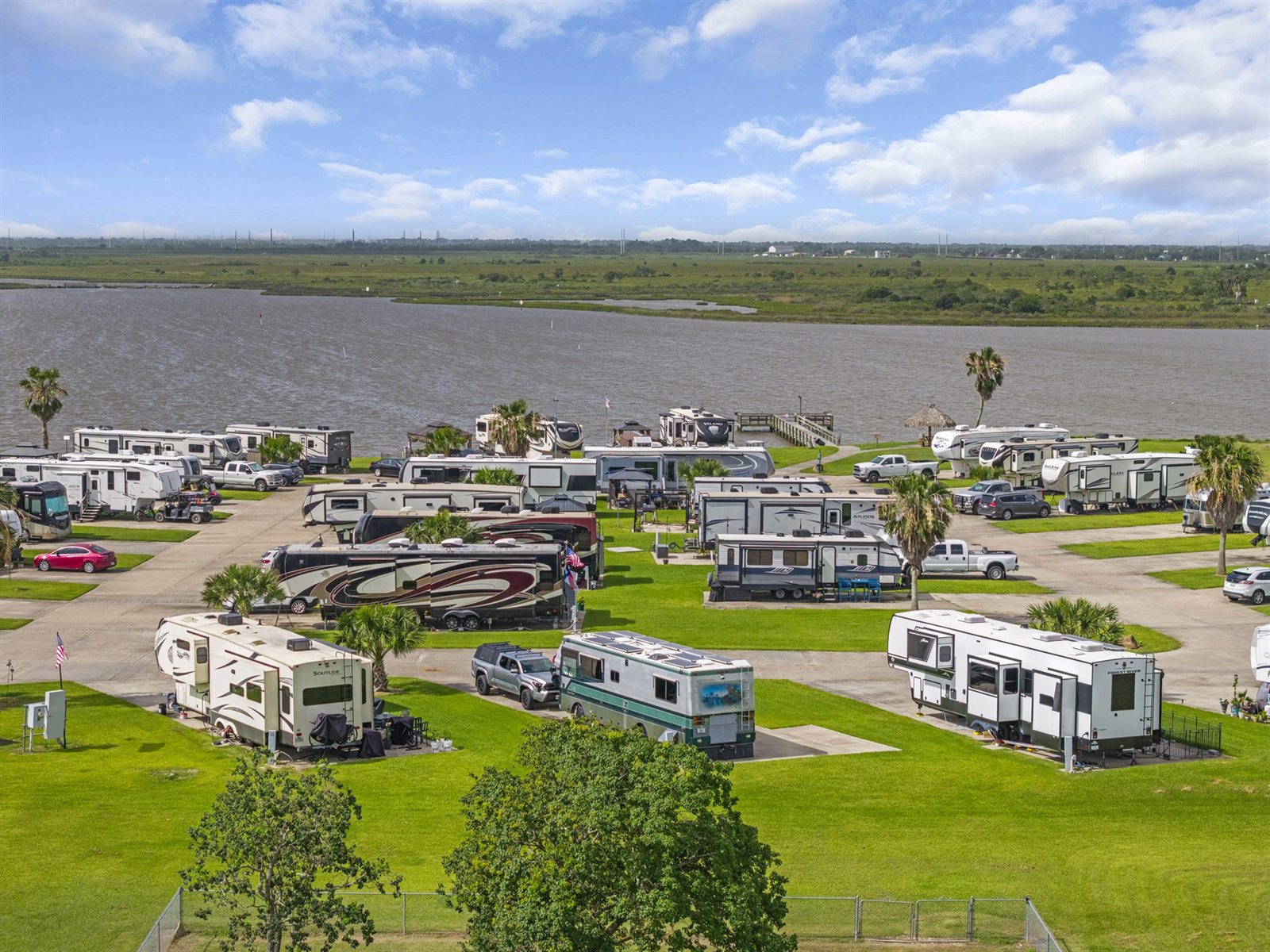 Waterfront Pull-Through and Back-In RV Sites with Concrete Pads on Dickinson Bayou